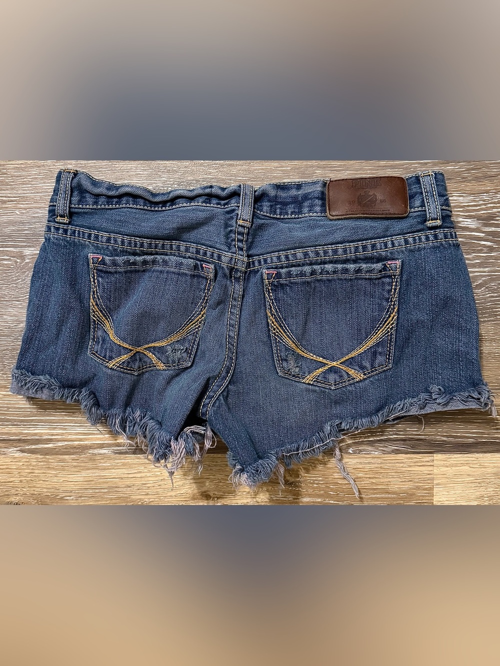 VTG 2005-2007 PINK Victoria's Secret Dark Blue Distressed Denim Low Rise Shorts - Picture 2 of 4